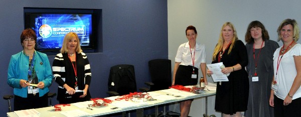 Volunteers gather at the chapter's October Women in Intelligence Group event.